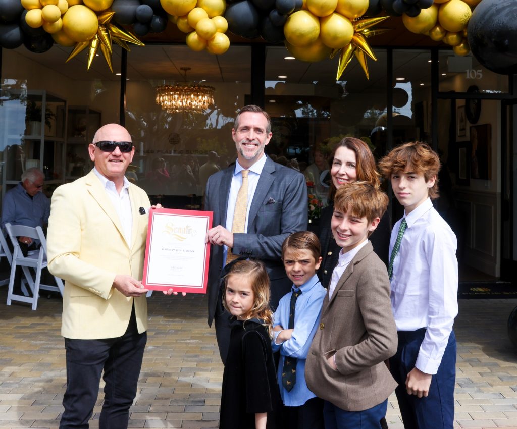 Dr. Daines with award