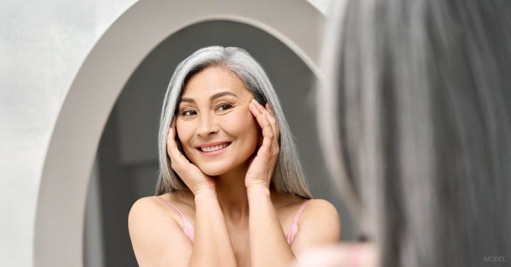 Woman after dermal filler treatments. (Model)